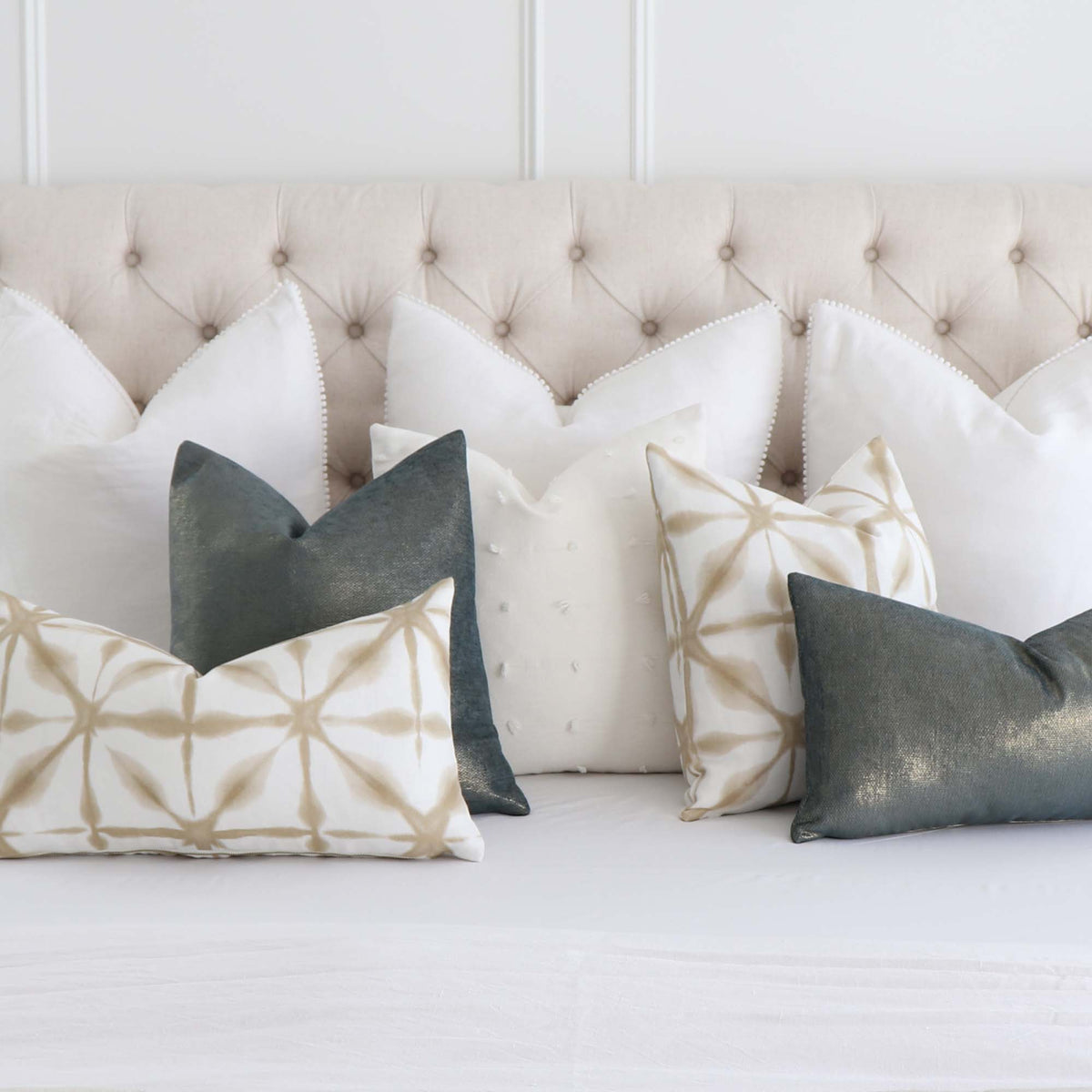 Schumacher Glimmer Peacock Blue Designer Luxury Throw Pillow Cover with Matching Throw Pillows on Bed