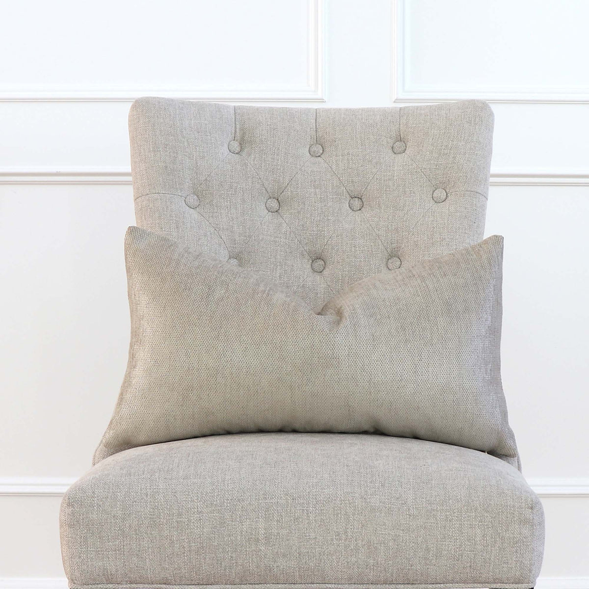 Schumacher Glimmer Champagne Textured Solid Designer Lumbar Throw Pillow Cover on Tufted Chair