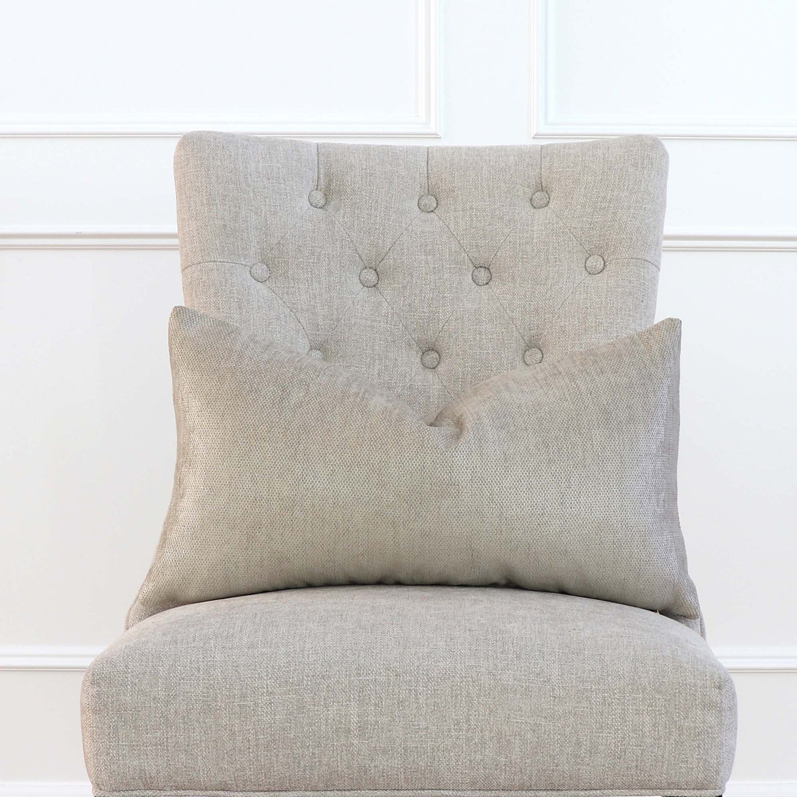 Schumacher Glimmer Champagne Textured Solid Designer Lumbar Throw Pillow Cover on Tufted Chair