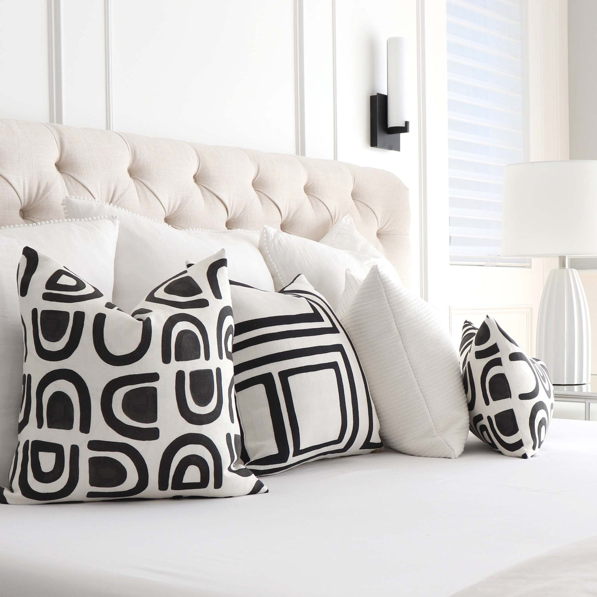 Schumacher Hidaya Williams Threshold Carbon Black Graphic Print Linen Decorative Throw Pillow Cover in Bedroom with Matching Throw Pillows