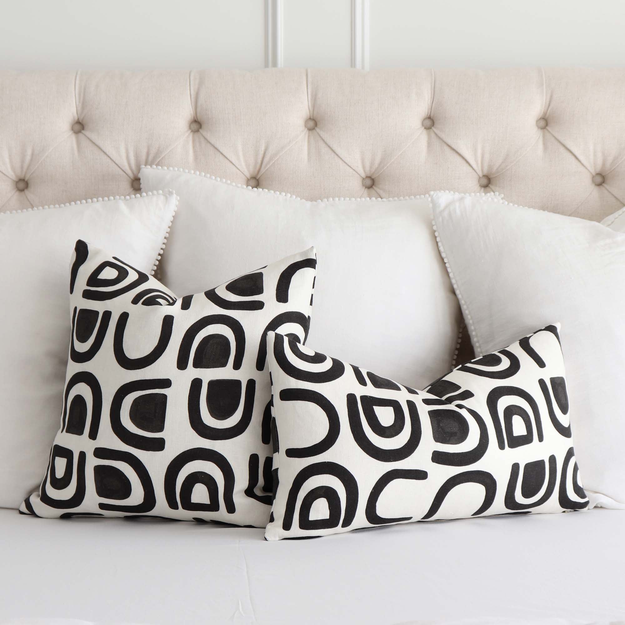 Schumacher Hidaya Williams Threshold Carbon Black Graphic Print Linen Decorative Throw Pillow Cover on King Bed with Big White Euro Shams