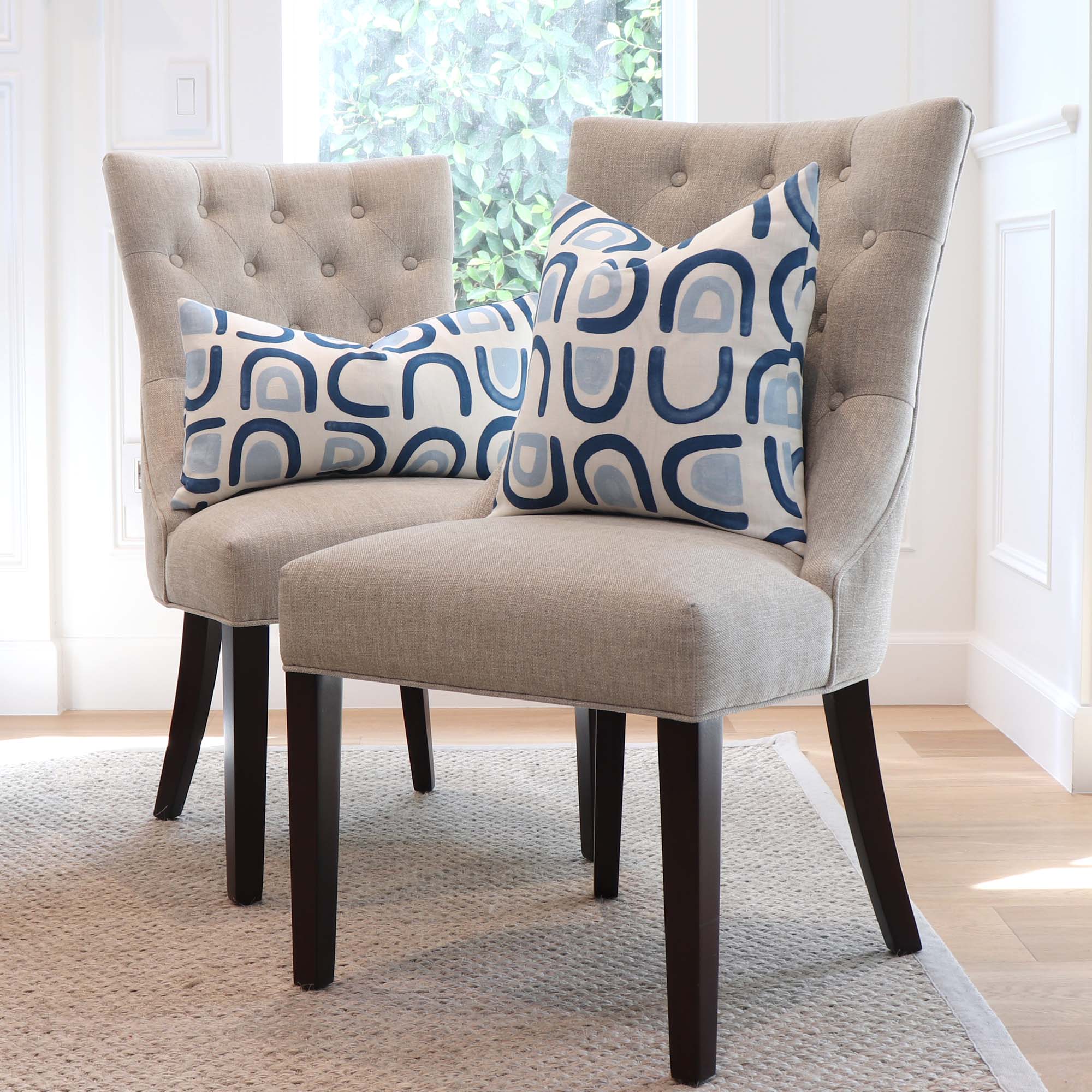 https://www.chloeandolive.com/cdn/shop/products/Schumacher-Hidaya-Williams-Threshold-Lapis-Blue-180422-Graphic-Print-Linen-Decorative-Throw-Pillow-Cover-on-Armless-Chairs-in-Home_2000x.jpg?v=1665942890