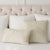 Schumacher Jessie Cut Velvet Ivory Designer Decorative Throw Pillow Cover on Bed with Large White Square Throw Pillows