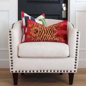 Schumacher Jokhang Tiger Velvet Red and Pink Luxury Designer Throw Pillows on White Accent Chair in Home Decor