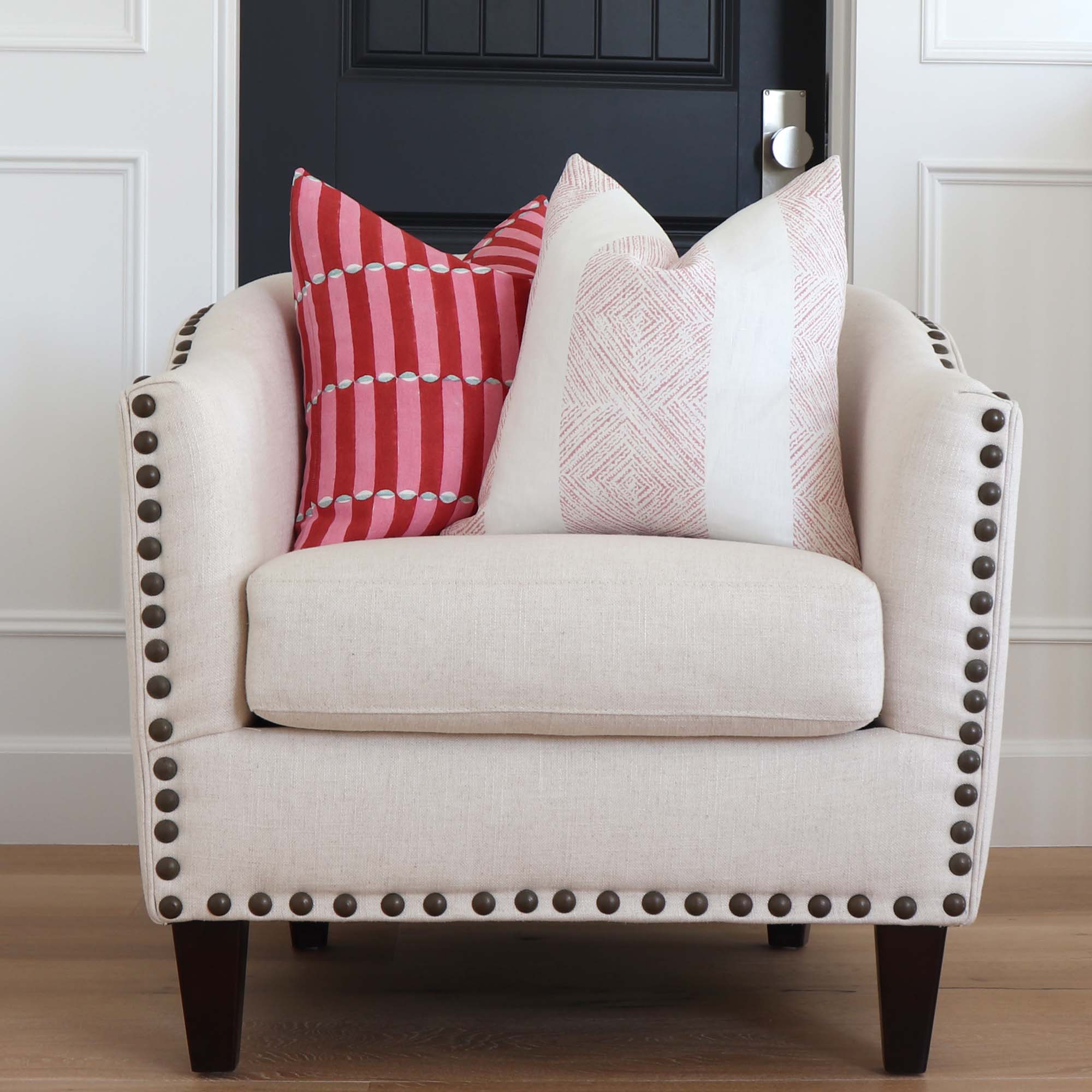 https://www.chloeandolive.com/cdn/shop/products/Schumacher-Luna-179280-Pink-Red-Graphic-Block-Print-Designer-Luxury-Decorative-Throw-Pillow-Cover-on-Accent-Chair-in-Home-Decor_5000x.jpg?v=1650769370