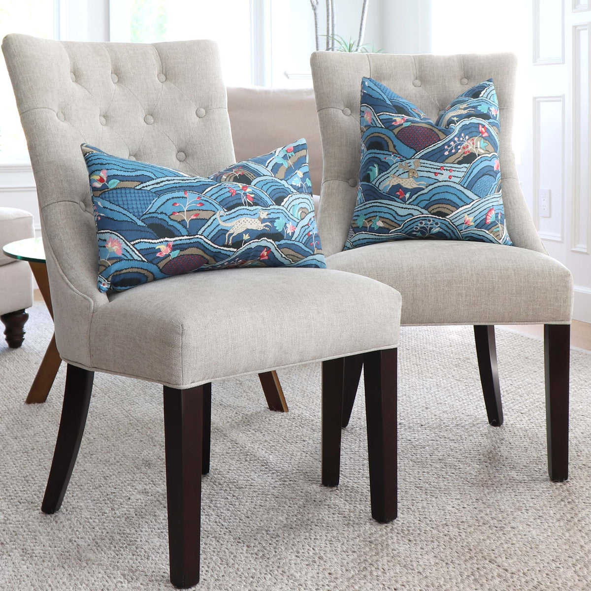 Schumacher Rolling Hills Blue Designer Throw Pillow Cover on Dining Chairs in Home Living Room