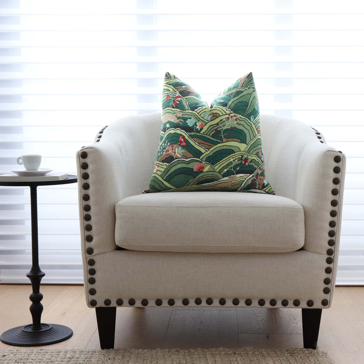 Schumacher Rolling Hills Green Luxury Designer Throw Pillow Cover on Arm Chair with Nail Heads