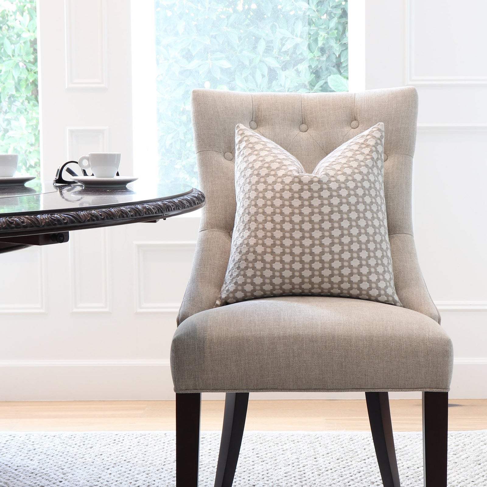 Schumacher Betwixt Stone Gray Throw Pillow Cover on Accent Chair