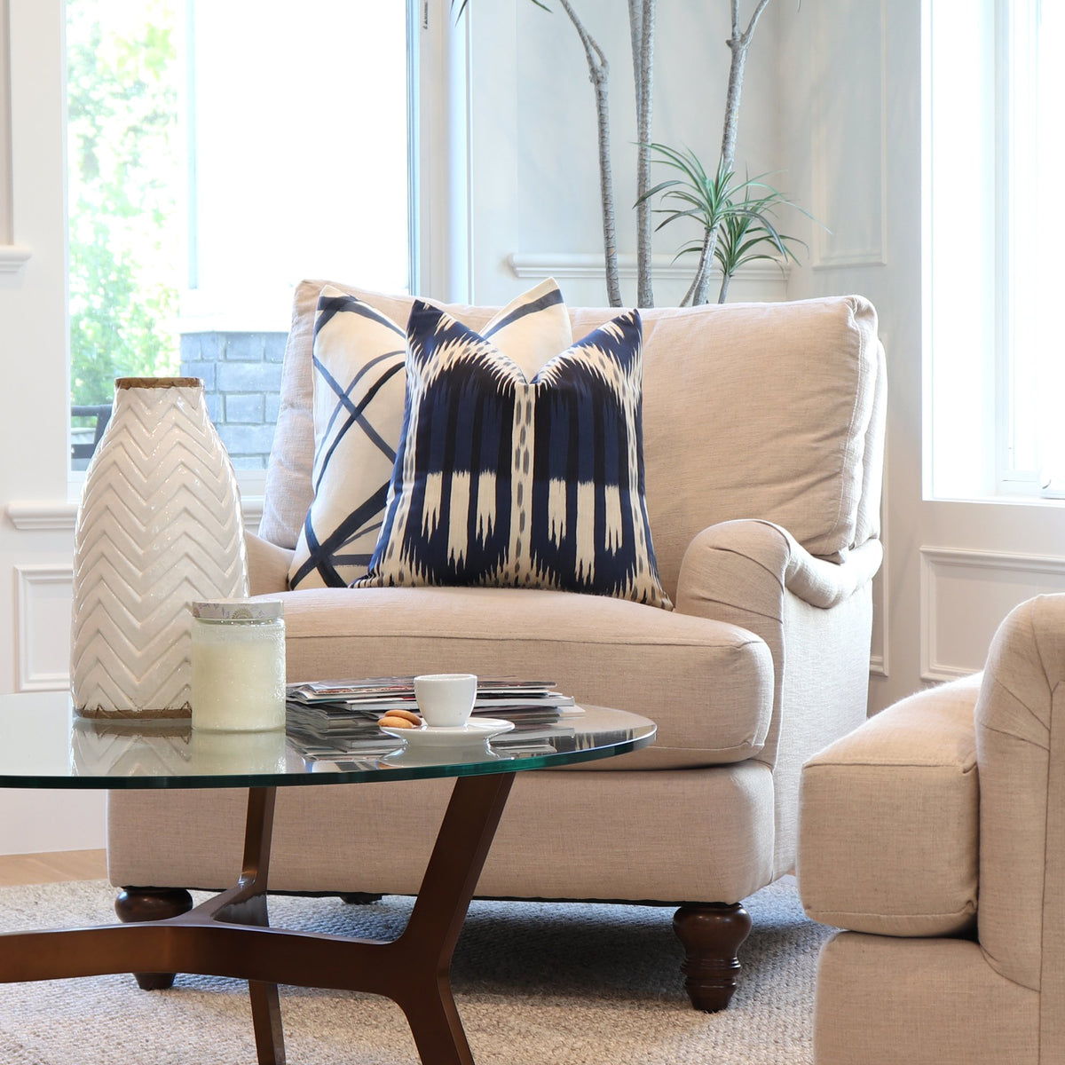 Schumacher Bukhara Ikat Indigo Throw Pillow Cover on Accent Chair