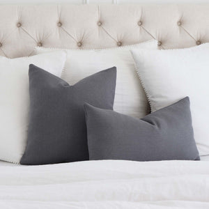 Tay Gray Solid Color Linen Designer Throw Pillow Cover on Bed with White Pom pom Euro Pillow Covers