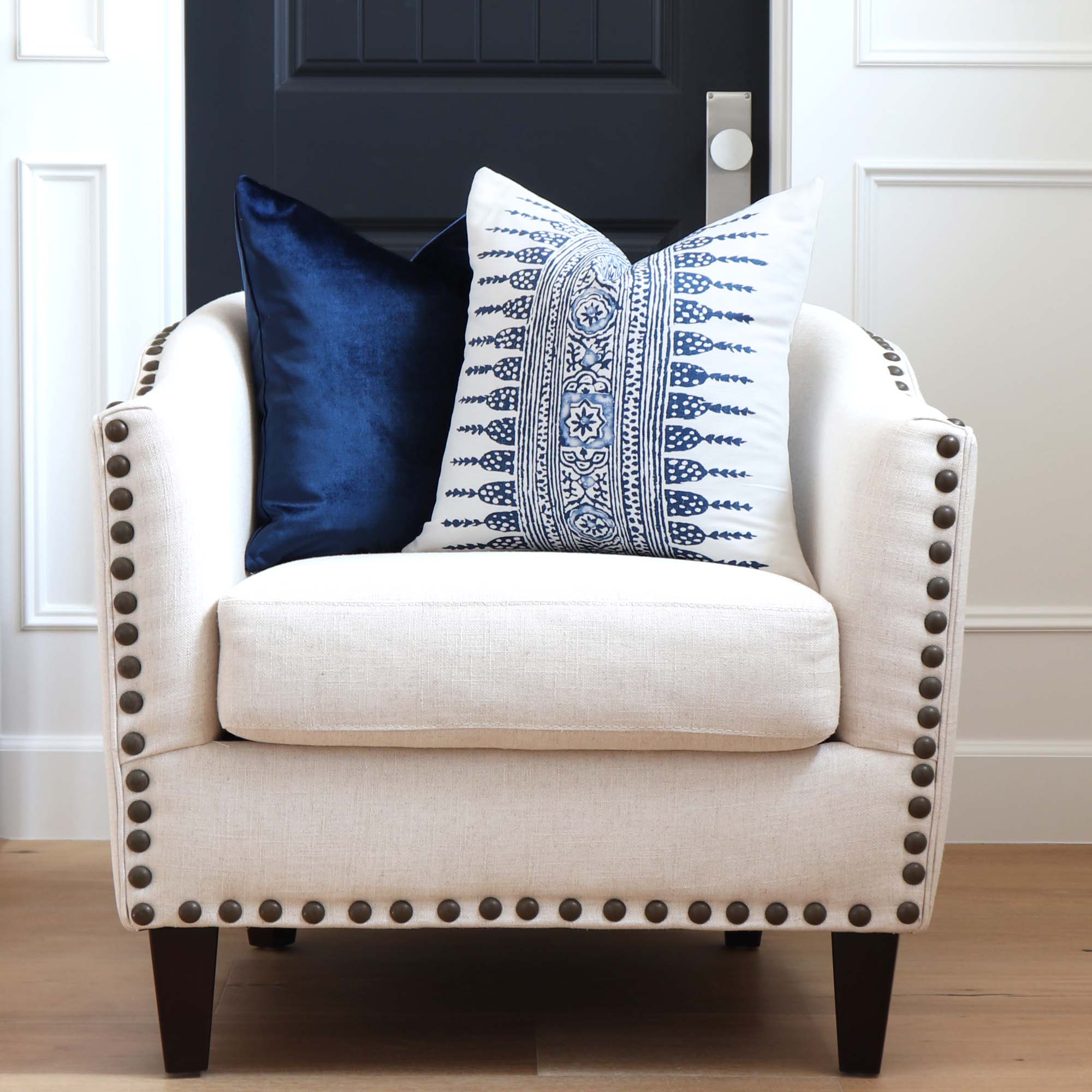 Thibaut Anna French Javanese Stripe Navy Blue Designer Luxury Decorative Throw Pillow Cover on Beige Side Chair