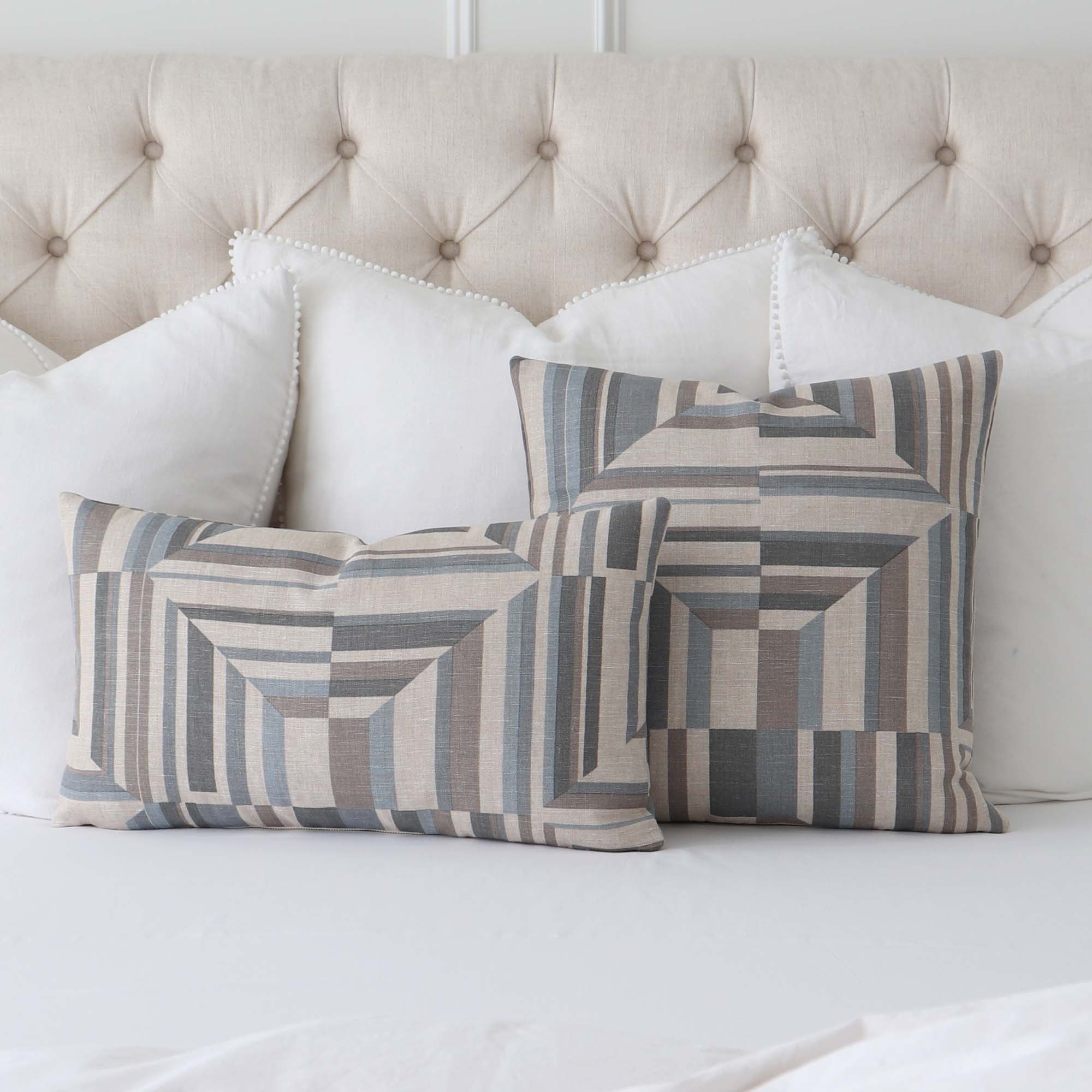 https://www.chloeandolive.com/cdn/shop/products/Thibaut-Cubism-Geometric-Spa-Blue-Flax-Stripes-Linen-Designer-Luxury-Decorative-Throw-Pillow-Cover-on-Bed-with-Large-White-Throw-Pillows_2000x.jpg?v=1660430968
