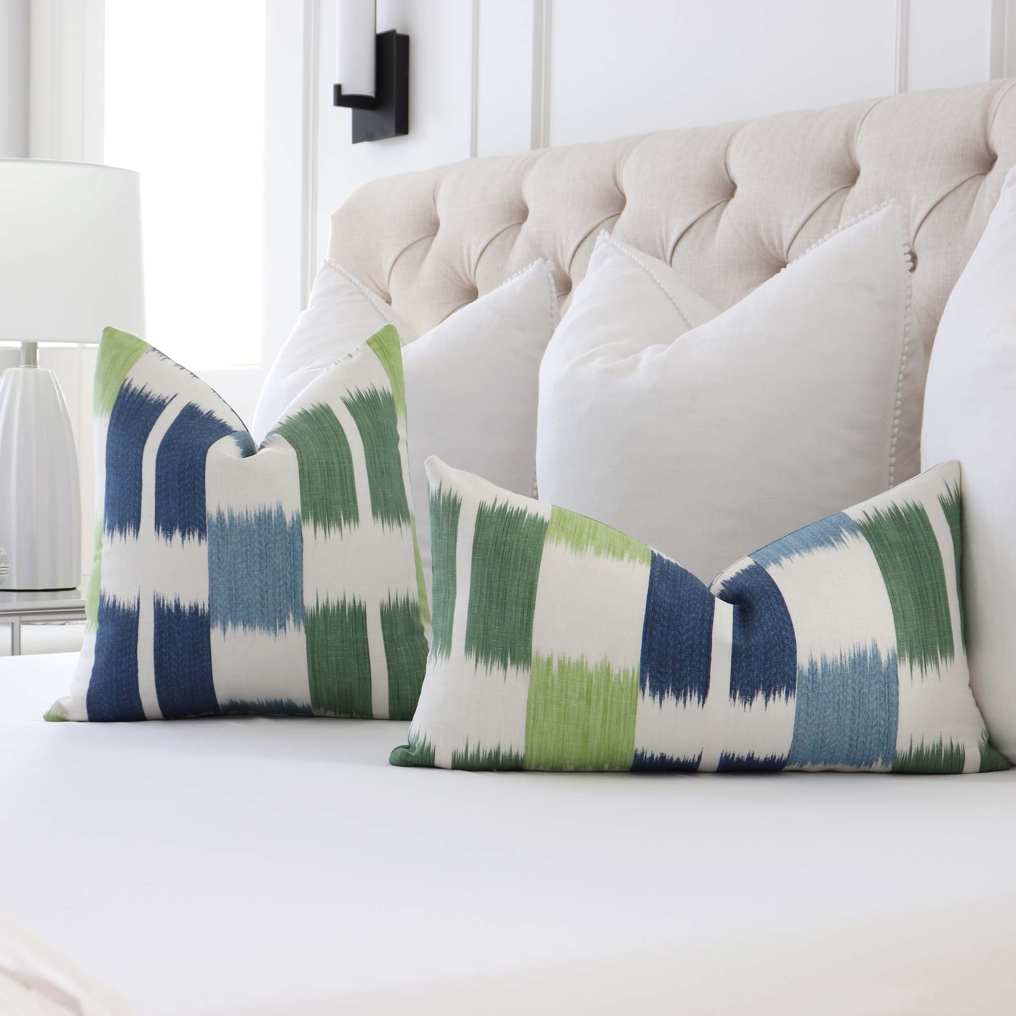 https://www.chloeandolive.com/cdn/shop/products/Thibaut-Kasuri-Blue-Green-F920839-Ikat-Geometric-Stripes-Decorative-Designer-Throw-Pillow-Cover-in-Bedroom_5000x.jpg?v=1649204438
