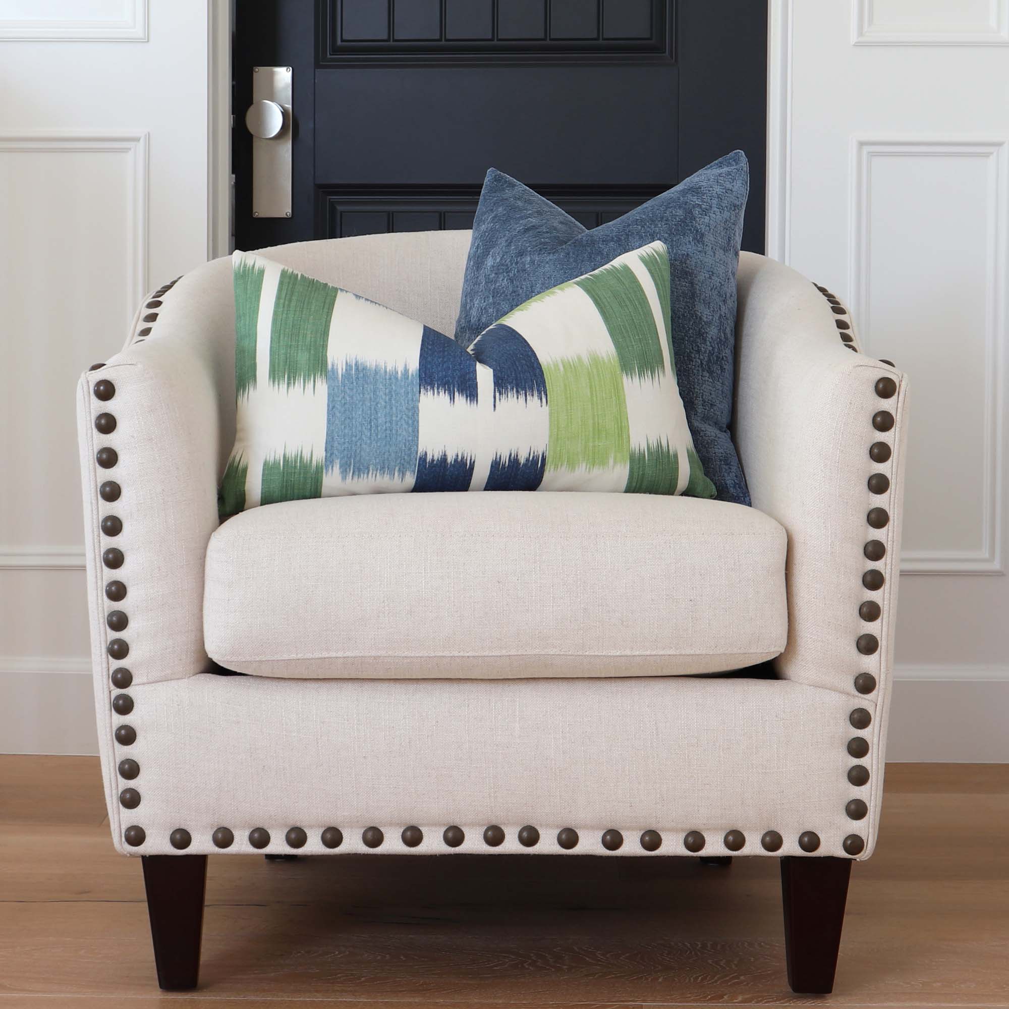 https://www.chloeandolive.com/cdn/shop/products/Thibaut-Kasuri-Blue-Green-F920839-Ikat-Geometric-Stripes-Decorative-Designer-Throw-Pillow-Cover-on-White-Accent-Chair-in-Home-Decor_5000x.jpg?v=1649204438