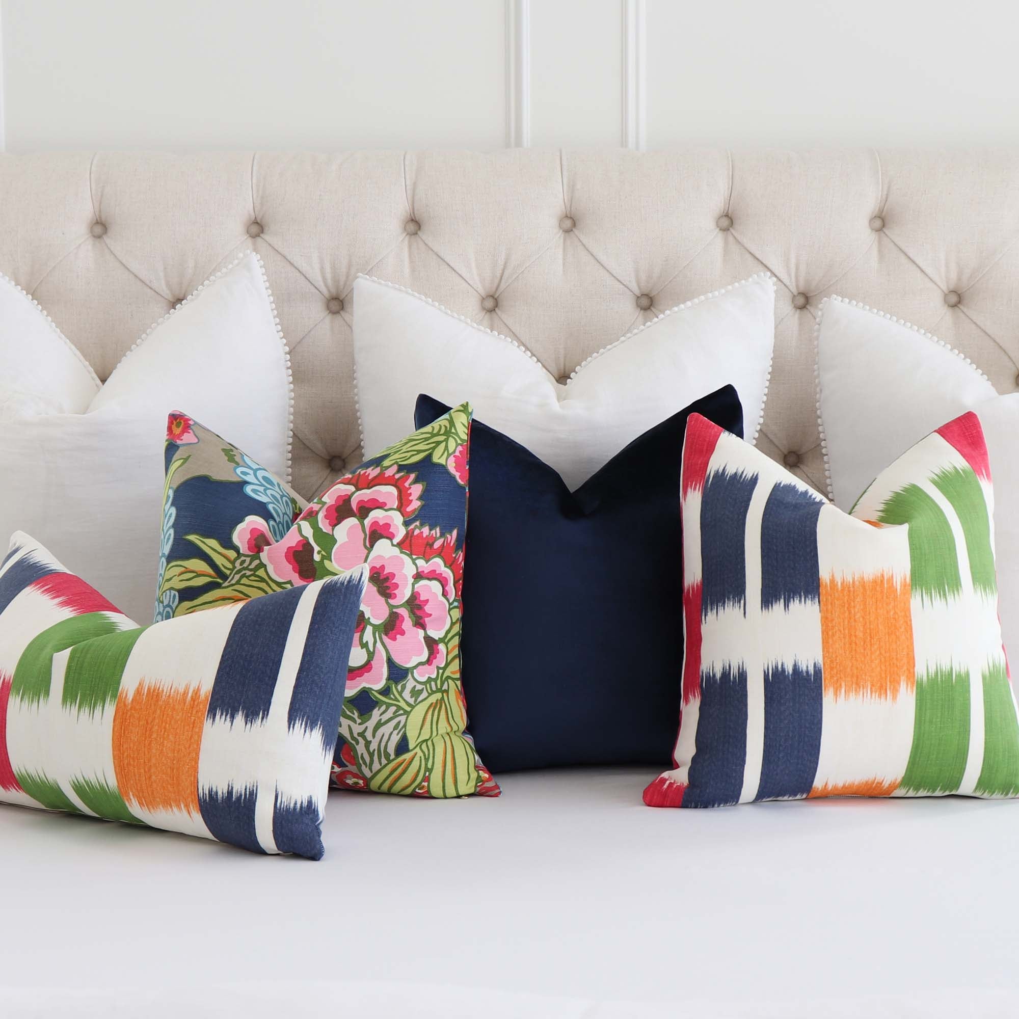 Thibaut Kasuri Stripe Green and Pink Ikat Decorative Designer Throw Pillow Cover with Matching Throw Pillows on Bed