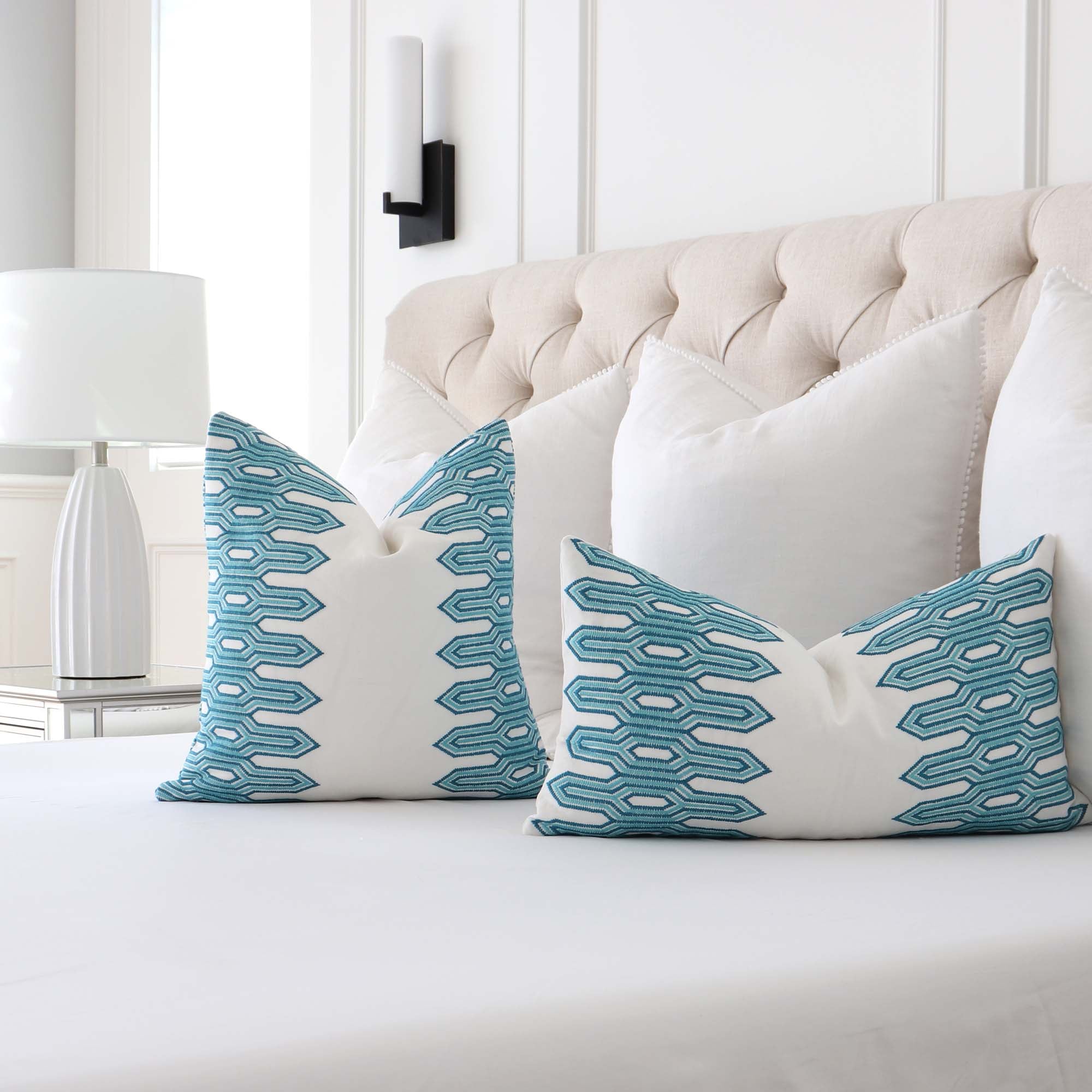 https://www.chloeandolive.com/cdn/shop/products/Thibaut-Nola-Stripe-Embroidery-W720811-Aqua-Blue-Geometric-Designer-Luxury-Decorative-Throw-Pillow-Cover-in-Bedroom_5000x.jpg?v=1649393103
