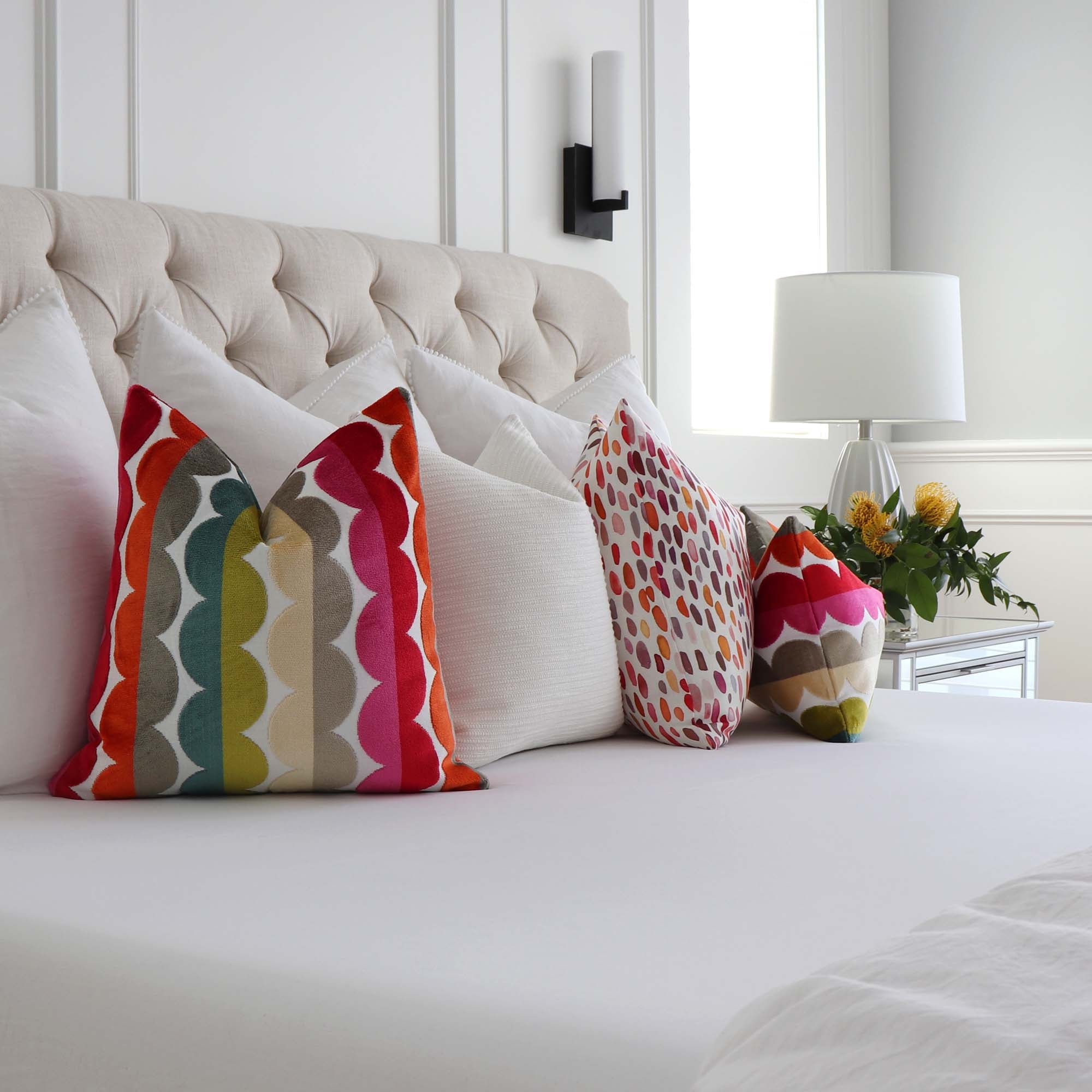 https://www.chloeandolive.com/cdn/shop/products/kravet-jonathan-adler-velvet-stripe-curvy-32165517-luxury-designer-decorative-throw-pillow-cover-in-bedroom-with-coordinating-throw-pillows_5000x.jpg?v=1655053918