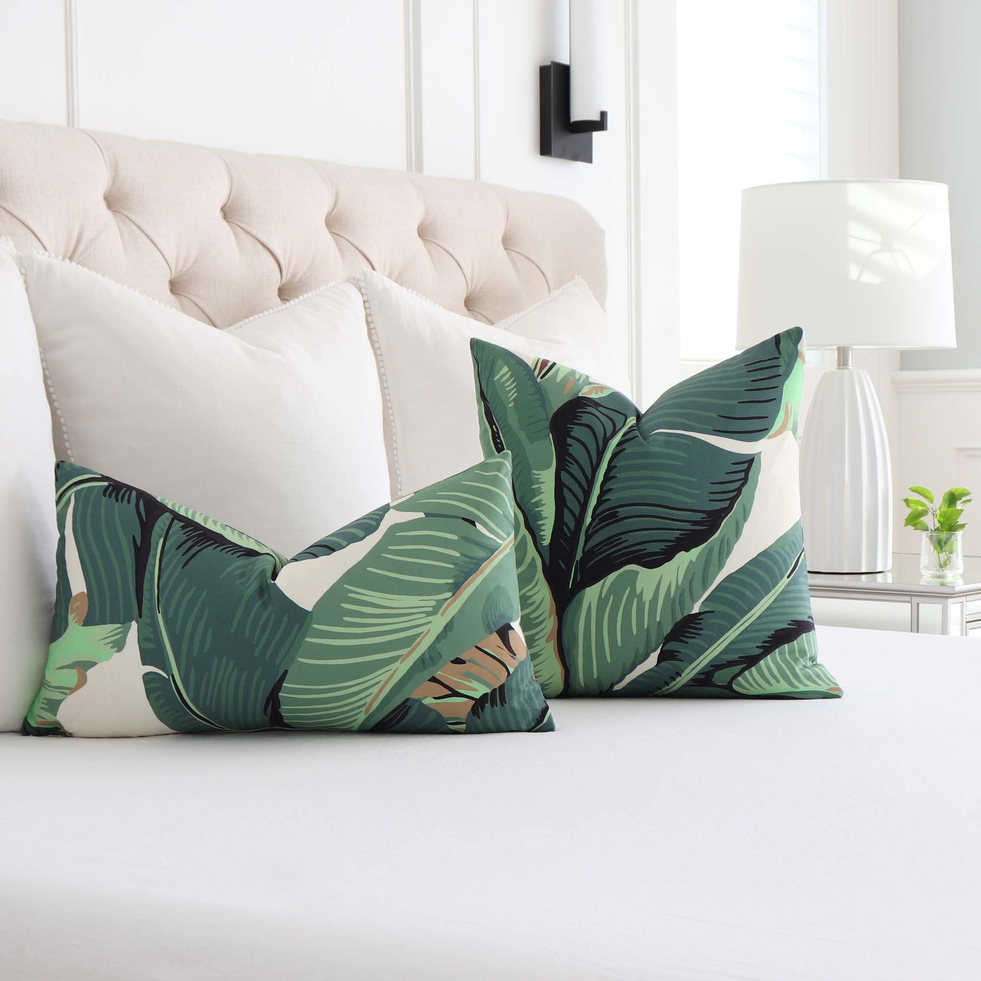 https://www.chloeandolive.com/cdn/shop/products/scalamandre-hinson-palm-green-HN000142010-banana-leaf-botanical-designer-luxury-throw-pillow-cover-in-bedroom_2000x.jpg?v=1676437625