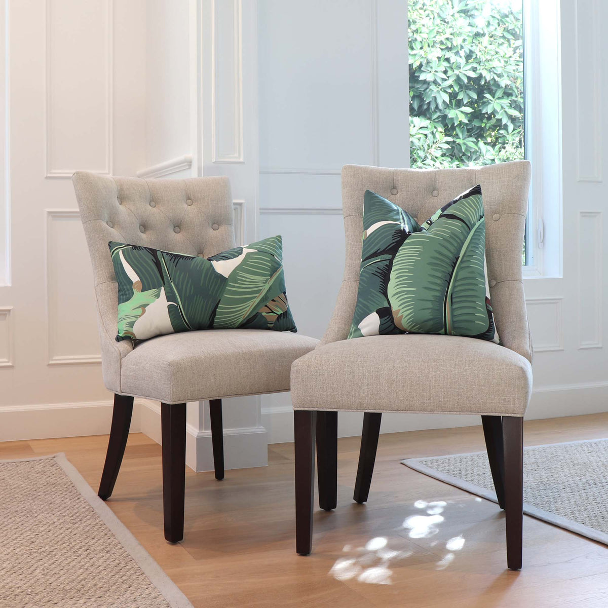 Scalamandre Hinson Palm Green Banana Leaf Botanical Designer Throw Pillow Cover on Chairs in Home Decor