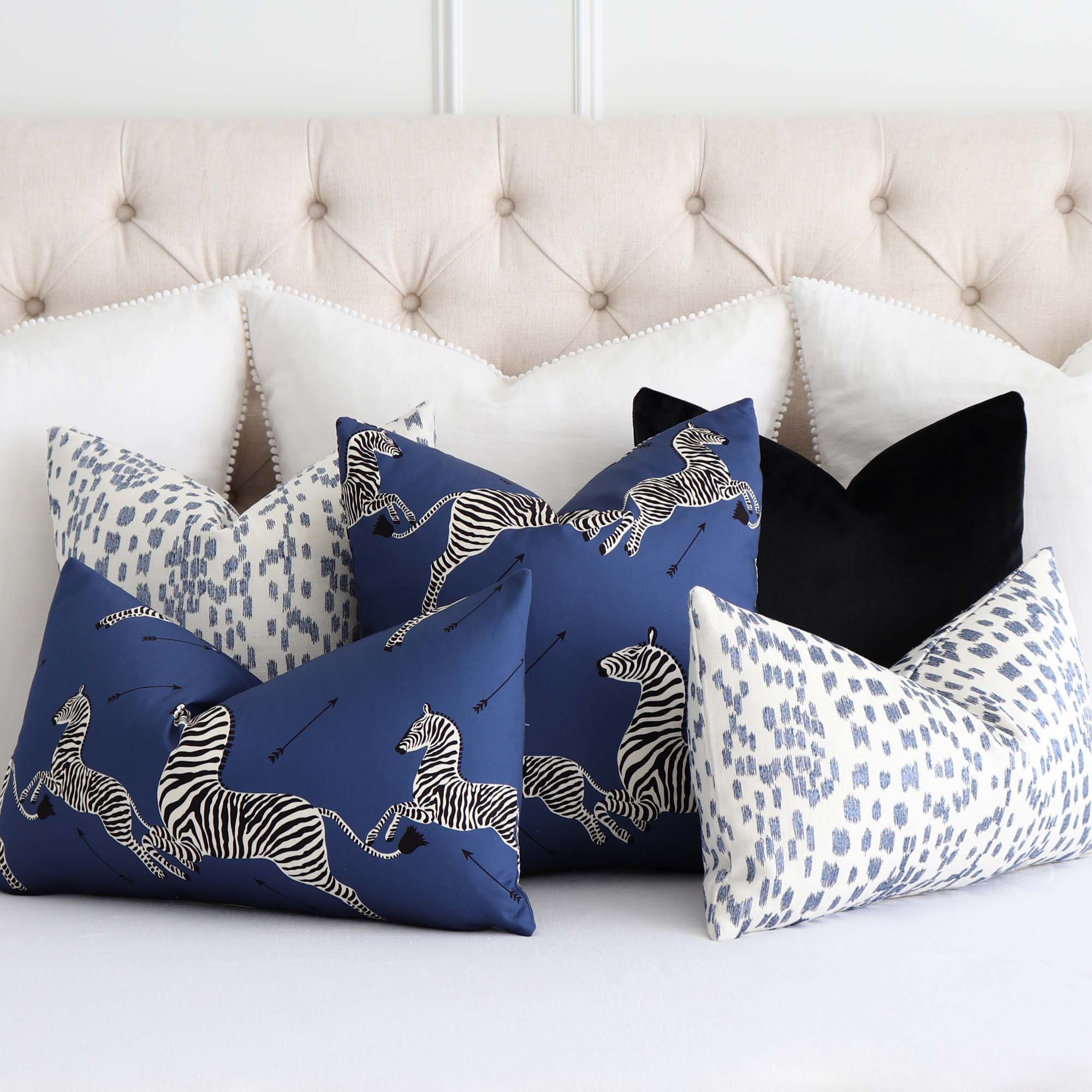 https://www.chloeandolive.com/cdn/shop/products/scalamandre-zebras-petite-denim-blue-SC000616641-designer-animal-print-throw-pillow-cover-with-coordinating-throw-pillows_5000x.jpg?v=1675904211