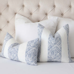 Thibaut Clipperton Stripe Navy and White Designer Luxury Linen Throw Pillow Cover On Tufted Bed with White Euro Shams
